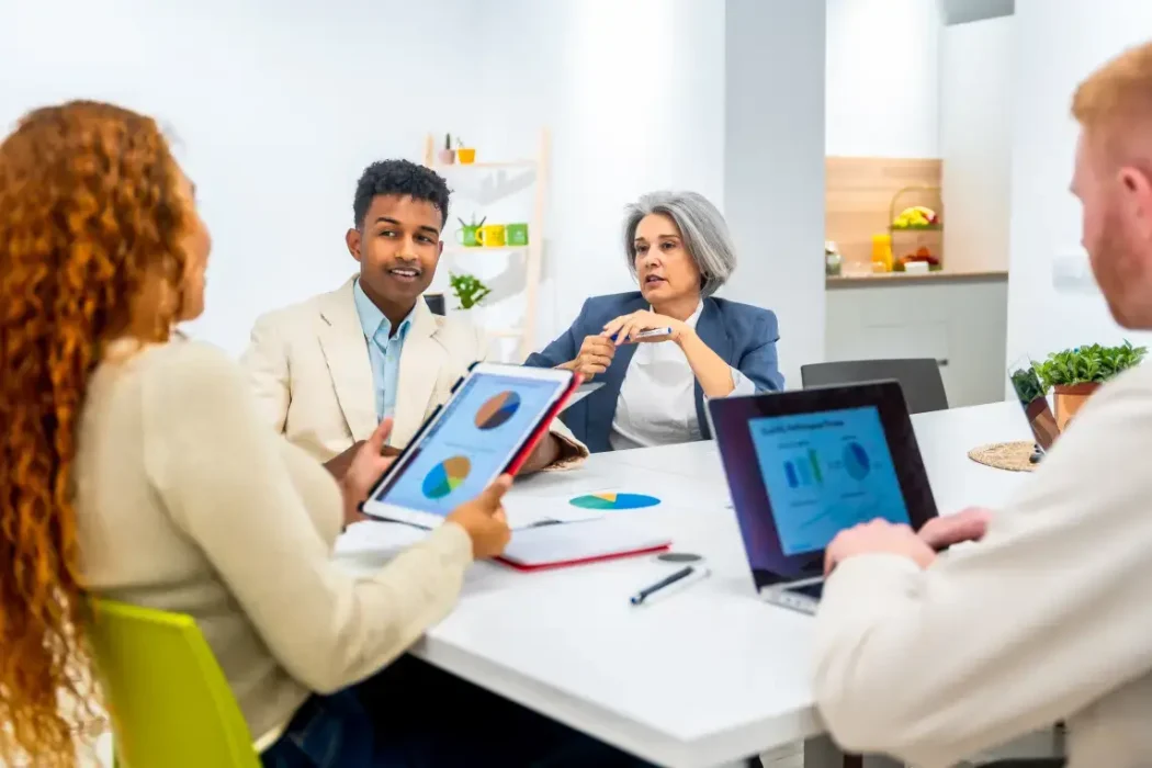 diverse-business-team-analyzing-data-during-office-2026-01-09-12-57-23-utc